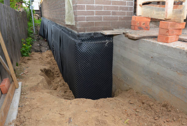 Happy homeowners after waterproofing job in Casstown